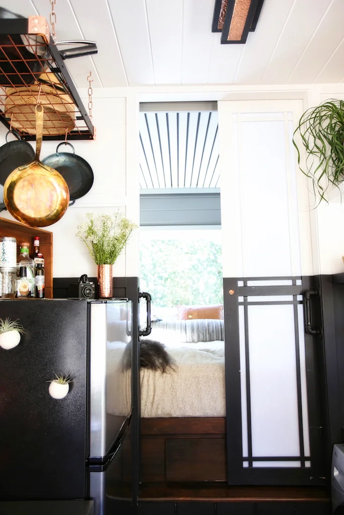 Natural light flooding through tiny house windows